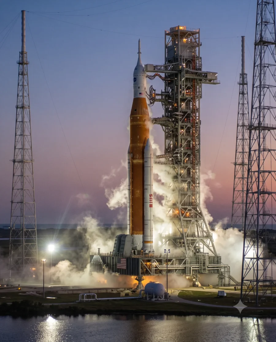 A cinematic, hyper-detailed prompt capturing an orbital-class rocket on the launchpad at dawn.